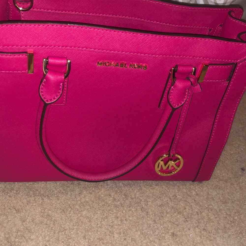 Michael Kors pink purse and matching wallet